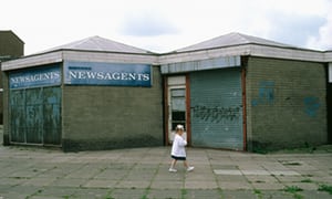  A young girl walking through a housing estate in Skelmersdale, Lancashire. Photograph: Alamy