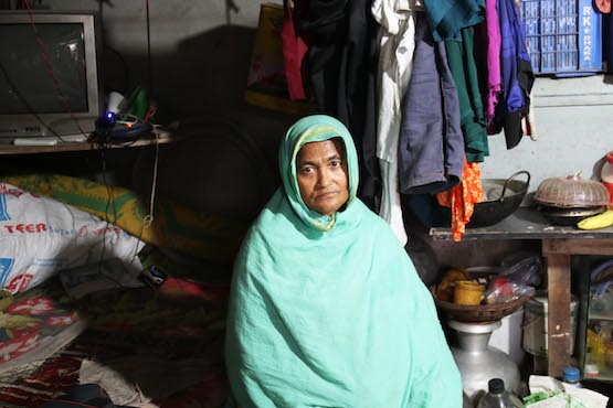 Rahima Begum, 55, a poor Muslim slum dweller in Dhaka on Nov. 26. Bangladesh’s poor, oppressed minorities and indigenous communities hope Pope Francis’ upcoming visit would promote harmony, peace and human rights. (Photo by Stephan Uttom/ucanews.com) 
