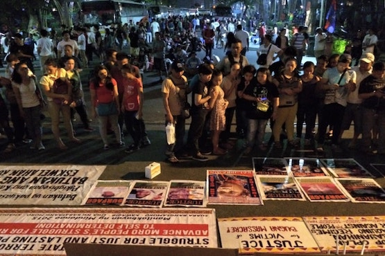 People in Manila flock to an exhibition on rights violations against indigenous people fighting against the encroachment of big development projects on their ancestral lands. (Inday Espina-Varona)