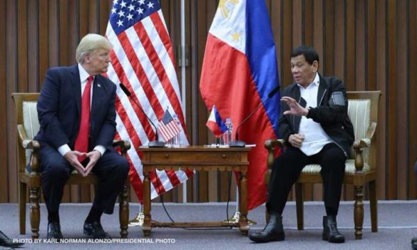 President Rodrigo Duterte (R) and U.S. President Donald Trump (L). FILE PHOTO